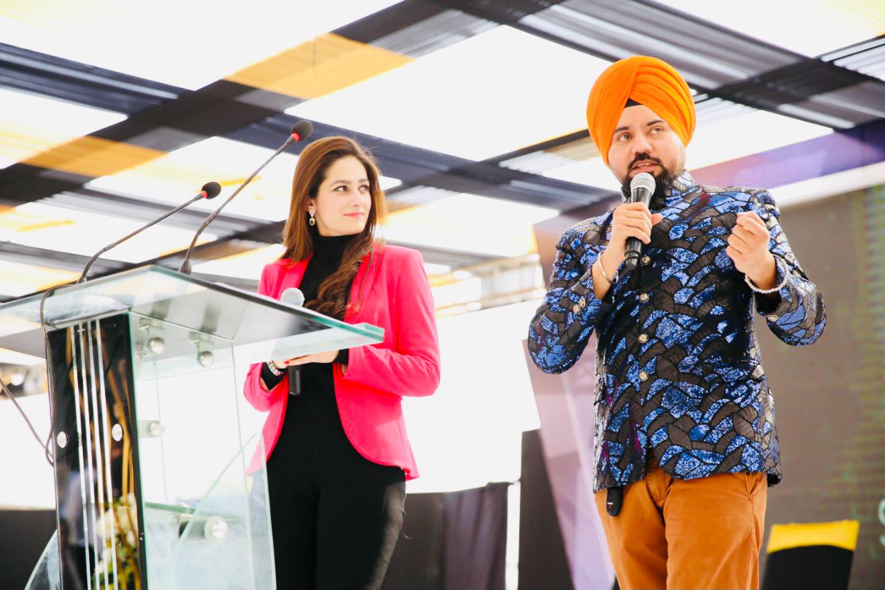 Taranjeet Singh as MC at a professional event